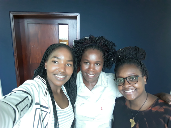 Moreangels Mbizah (middle) after a tutorial session with Joseline Ihirwe (left) and Nancy Nthiga (right)